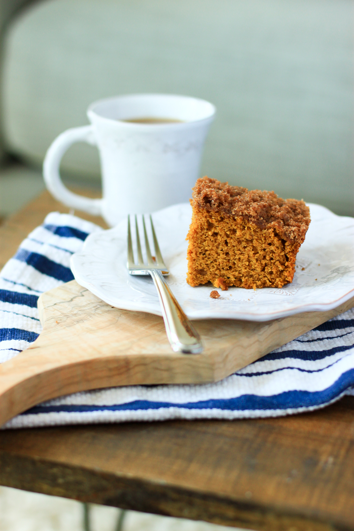 Pumpkin Coffee Cake on a plate and cup of coffee