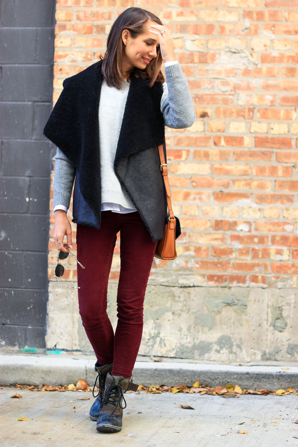 faux fur vest, colorblock sweater, skinny corduroys, sorel boots, women's fashion, the fox and she