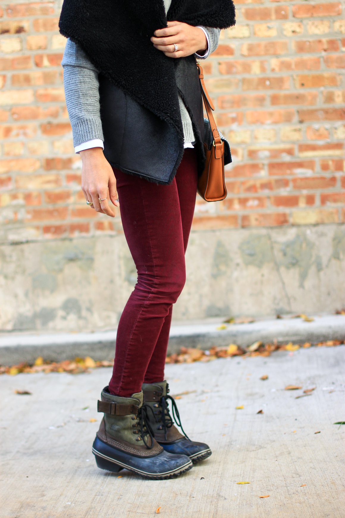 faux fur vest, colorblock sweater, skinny corduroys, sorel boots, women's fashion, the fox and she
