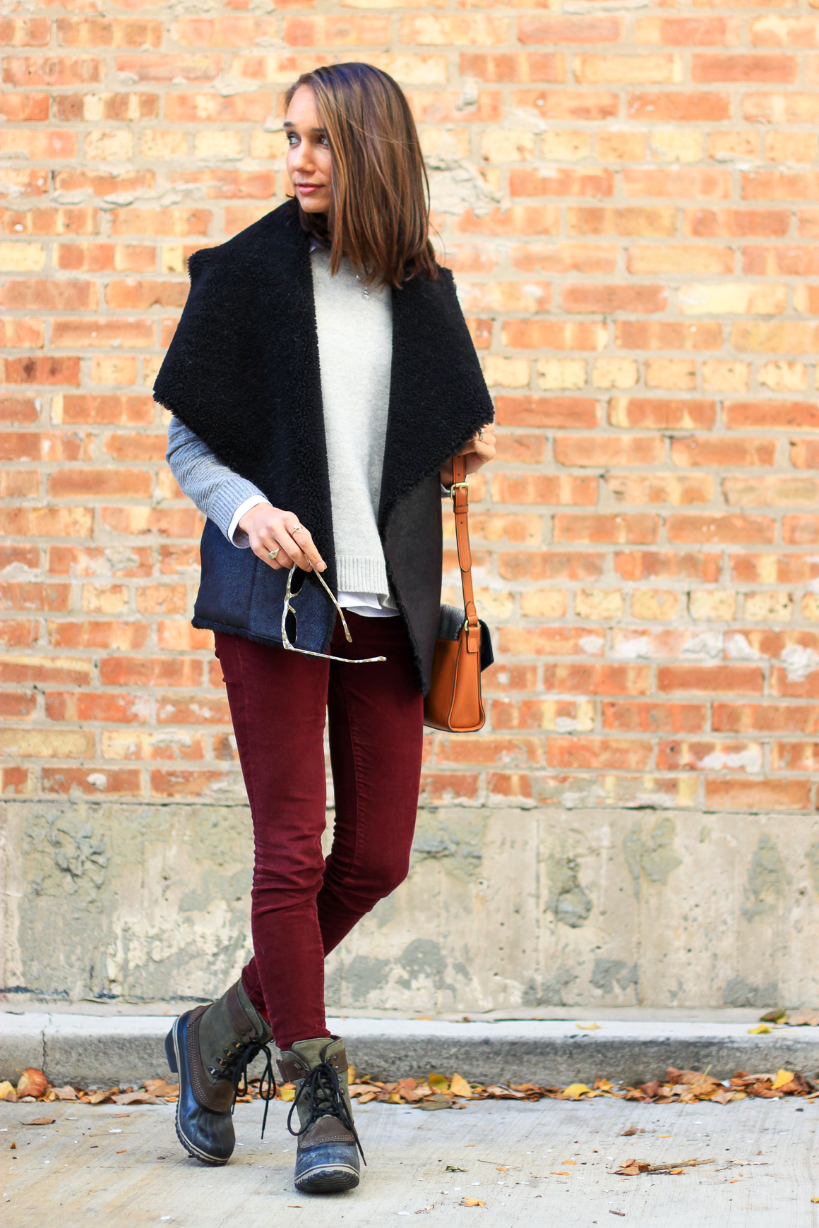 faux fur vest, colorblock sweater, skinny corduroys, sorel boots, women's fashion, the fox and she