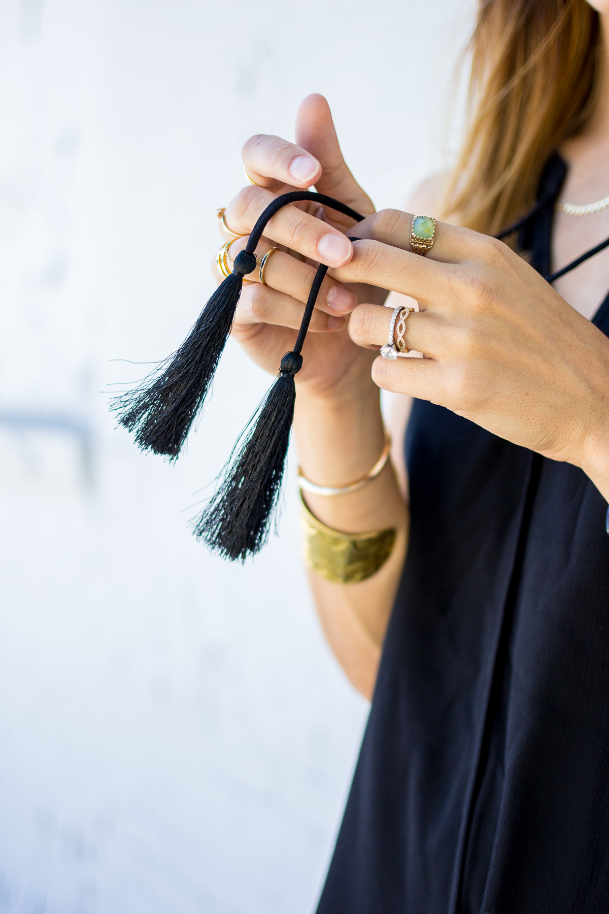 tasseled black dress — via @TheFoxandShe