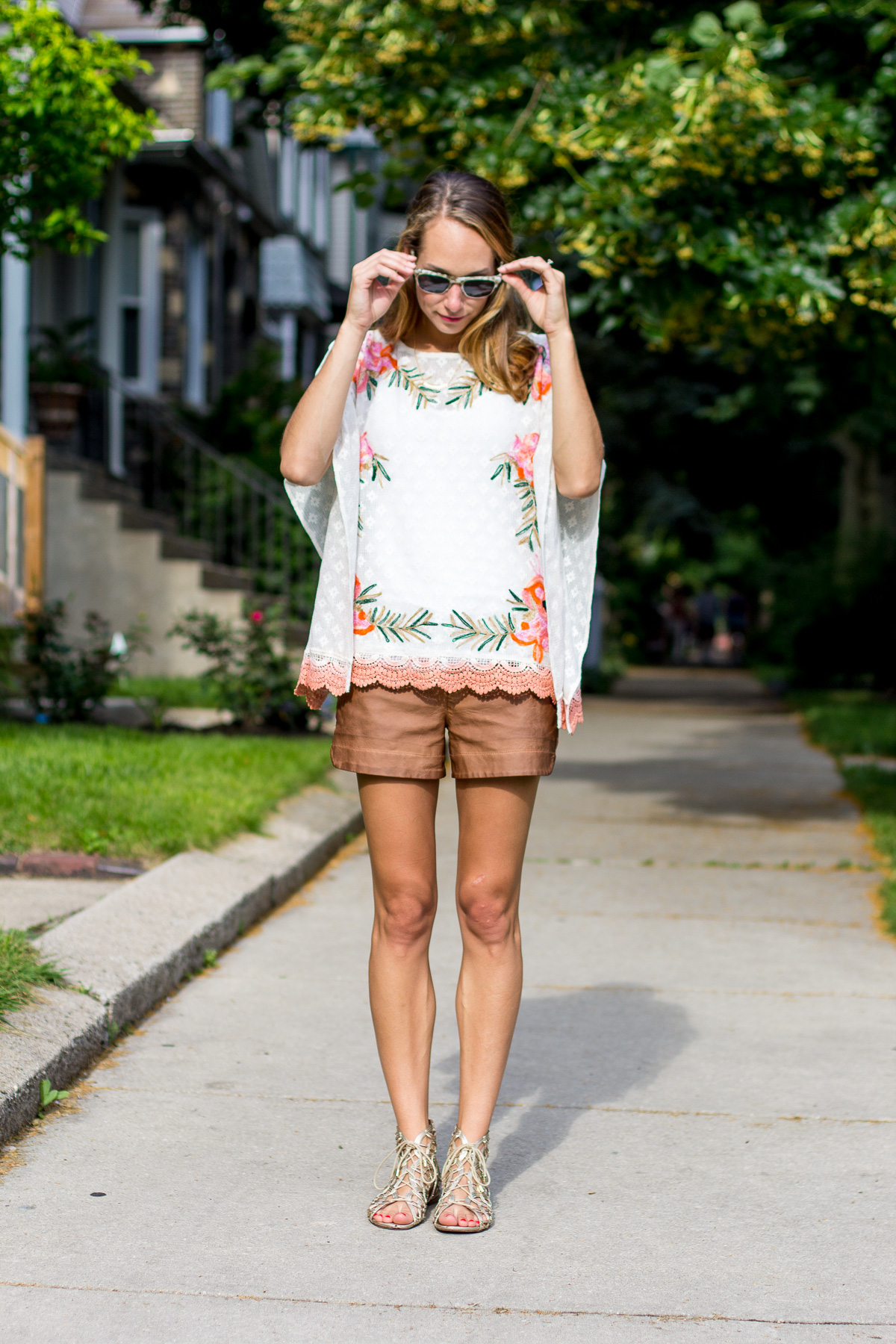 embroidered poncho and vegan leather shorts —&nbsp;via @TheFoxandShe
