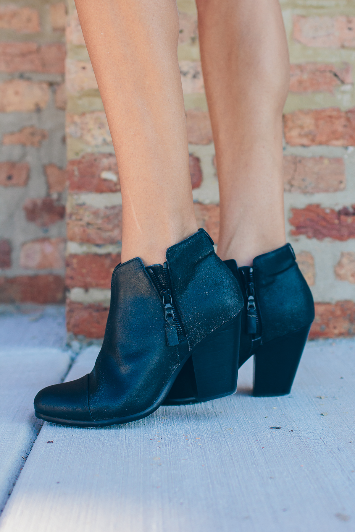 black leather booties — via @TheFoxandShe