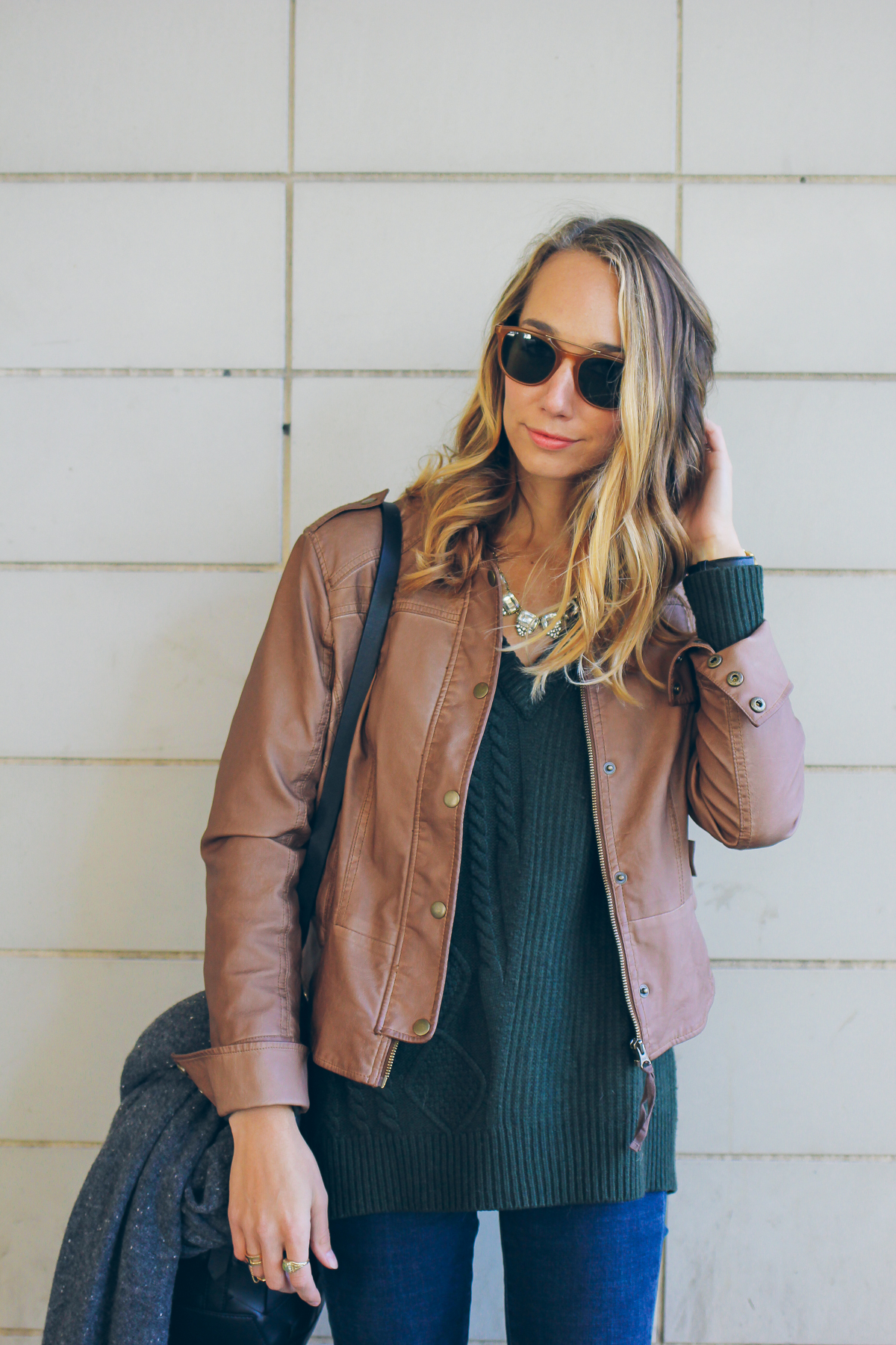 vegan leather jacket and cable knit sweater — via @TheFoxandShe