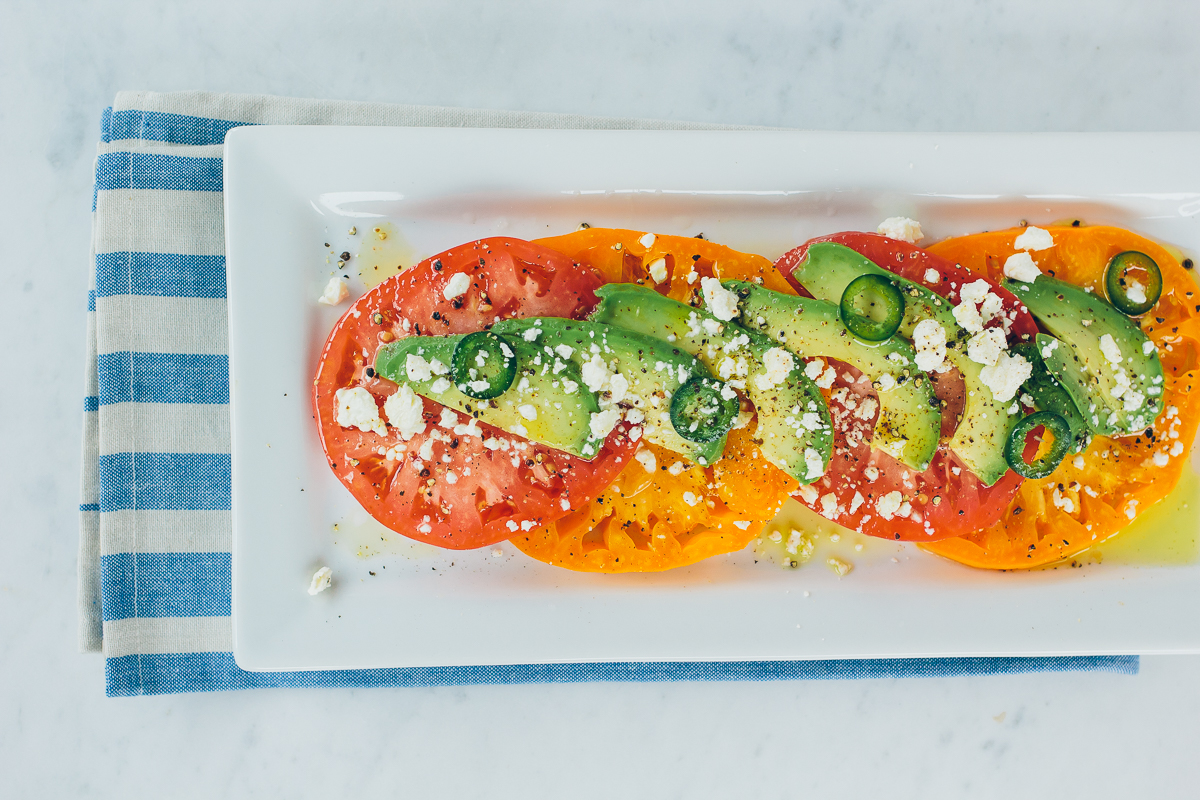 Heirloom Tomato Salad with Avocado, Jalapeno & Feta — via @TheFoxandShe