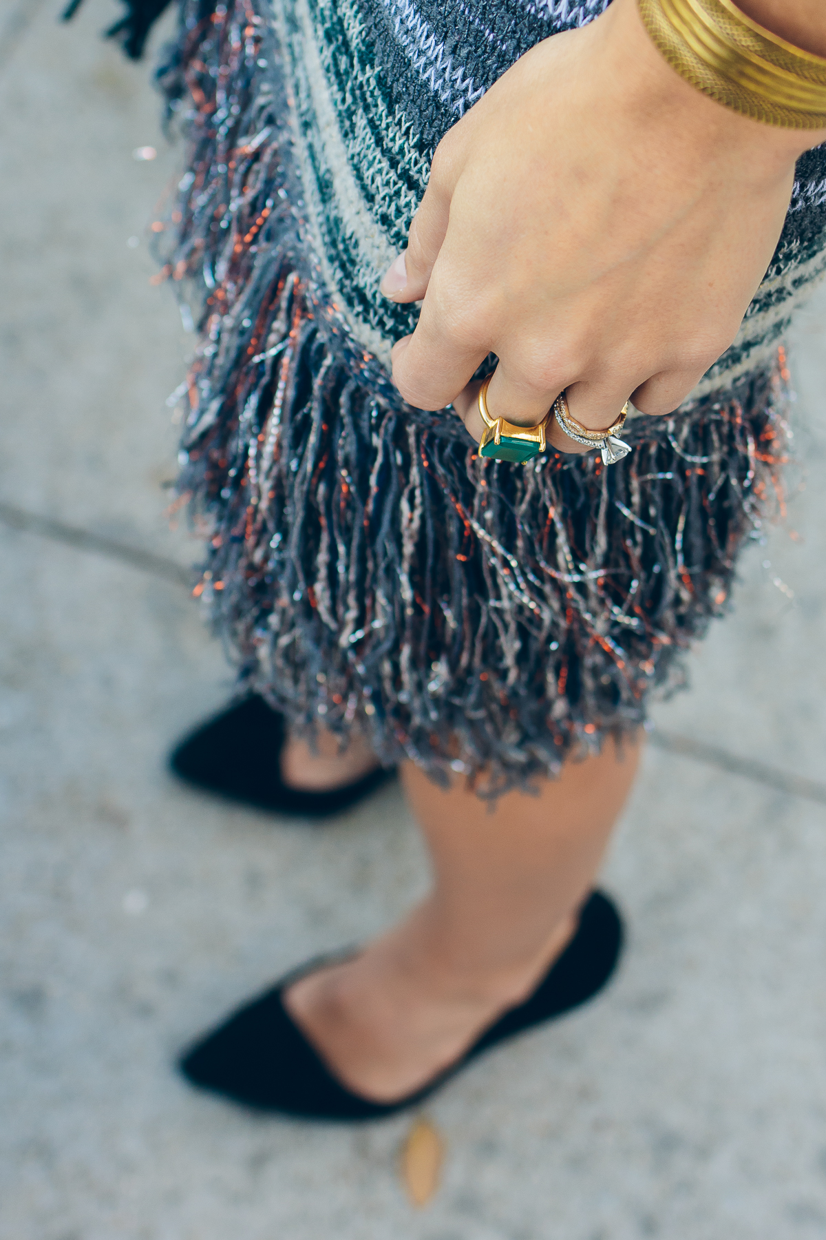 fringed skirt, emerald green cocktail ring, margaret elizabeth jewelry — via @TheFoxandShe