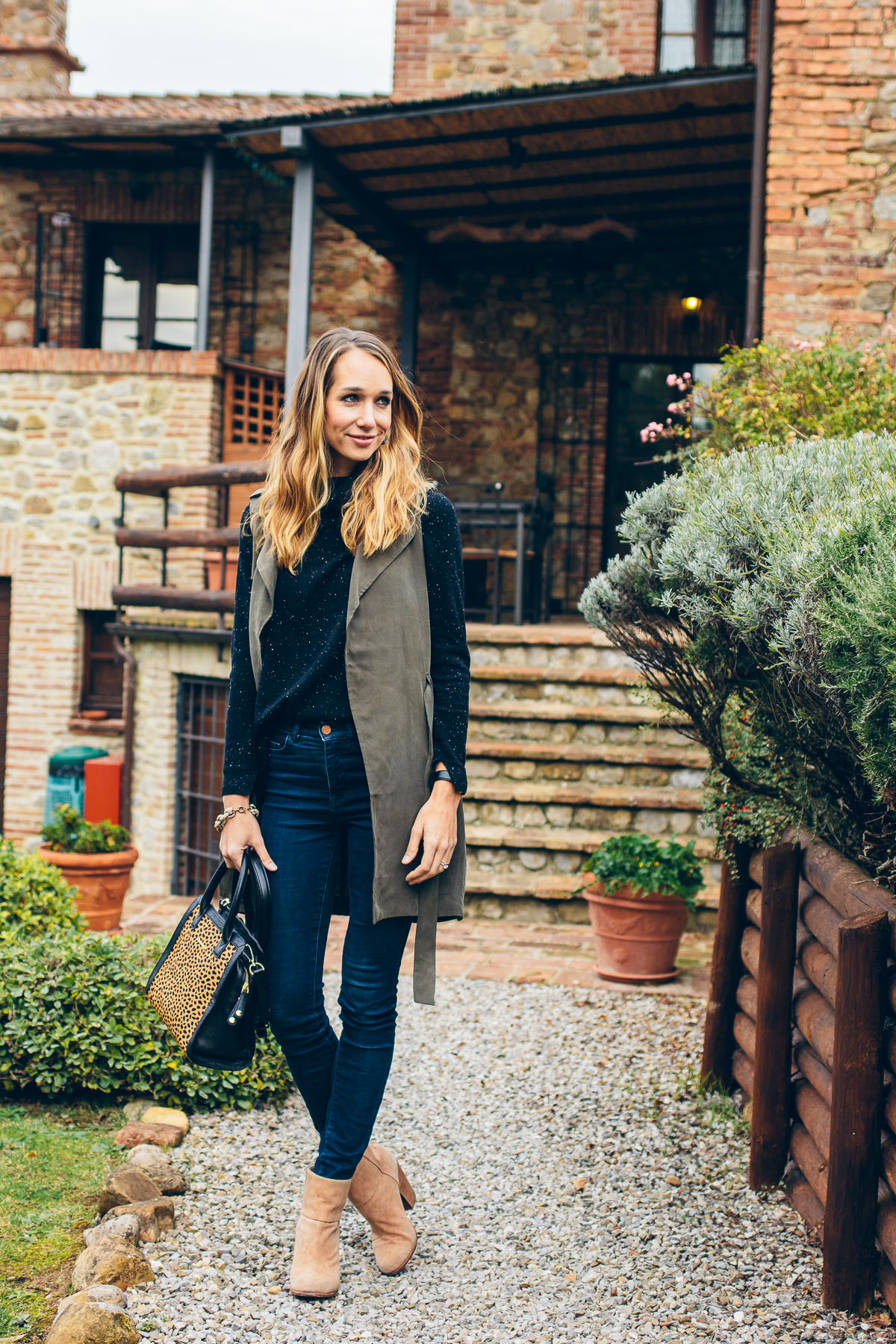 trench vest, black cashmere sweater, winter outfit — via @TheFoxandShe