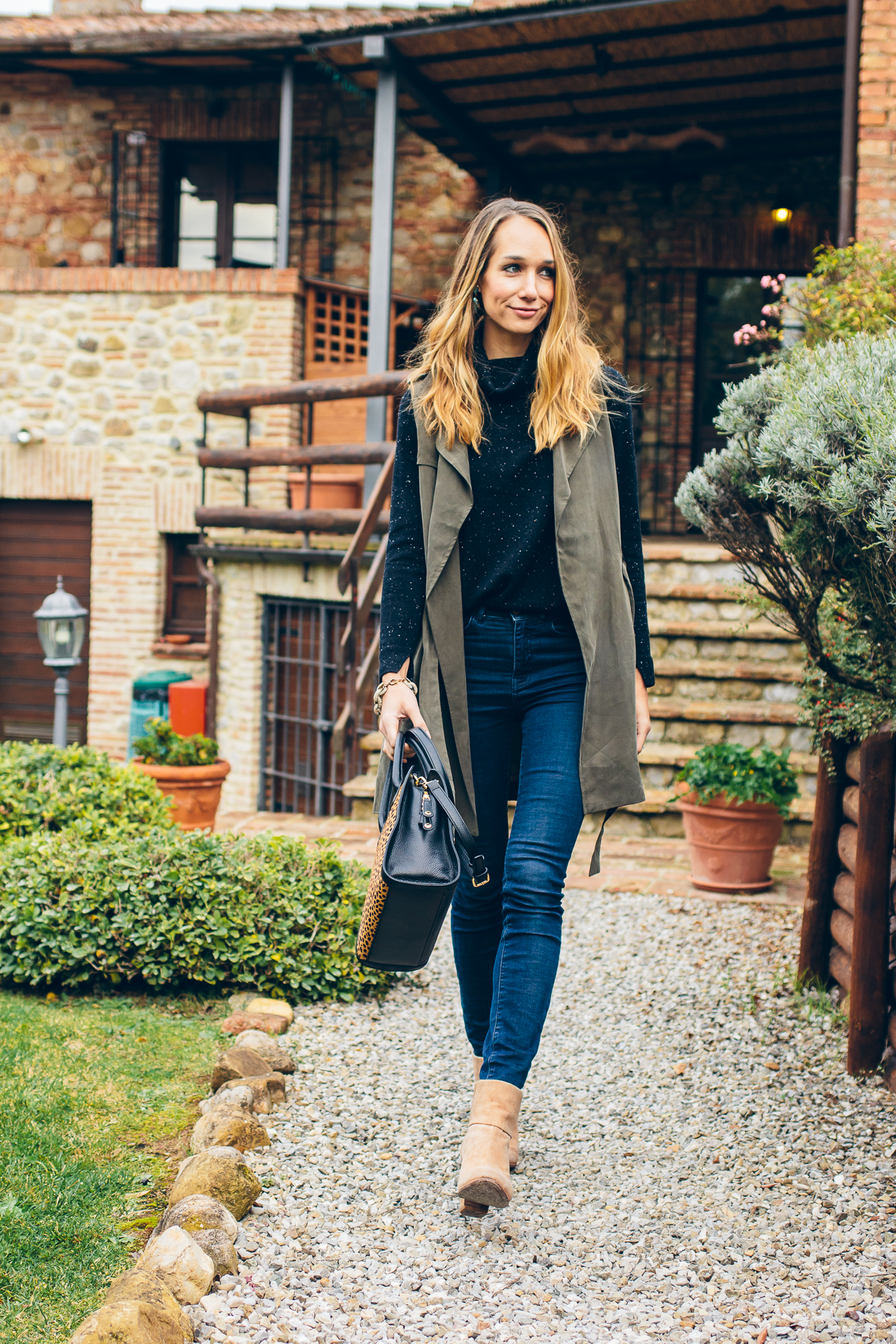 trench vest, black cashmere sweater, winter outfit — via @TheFoxandShe