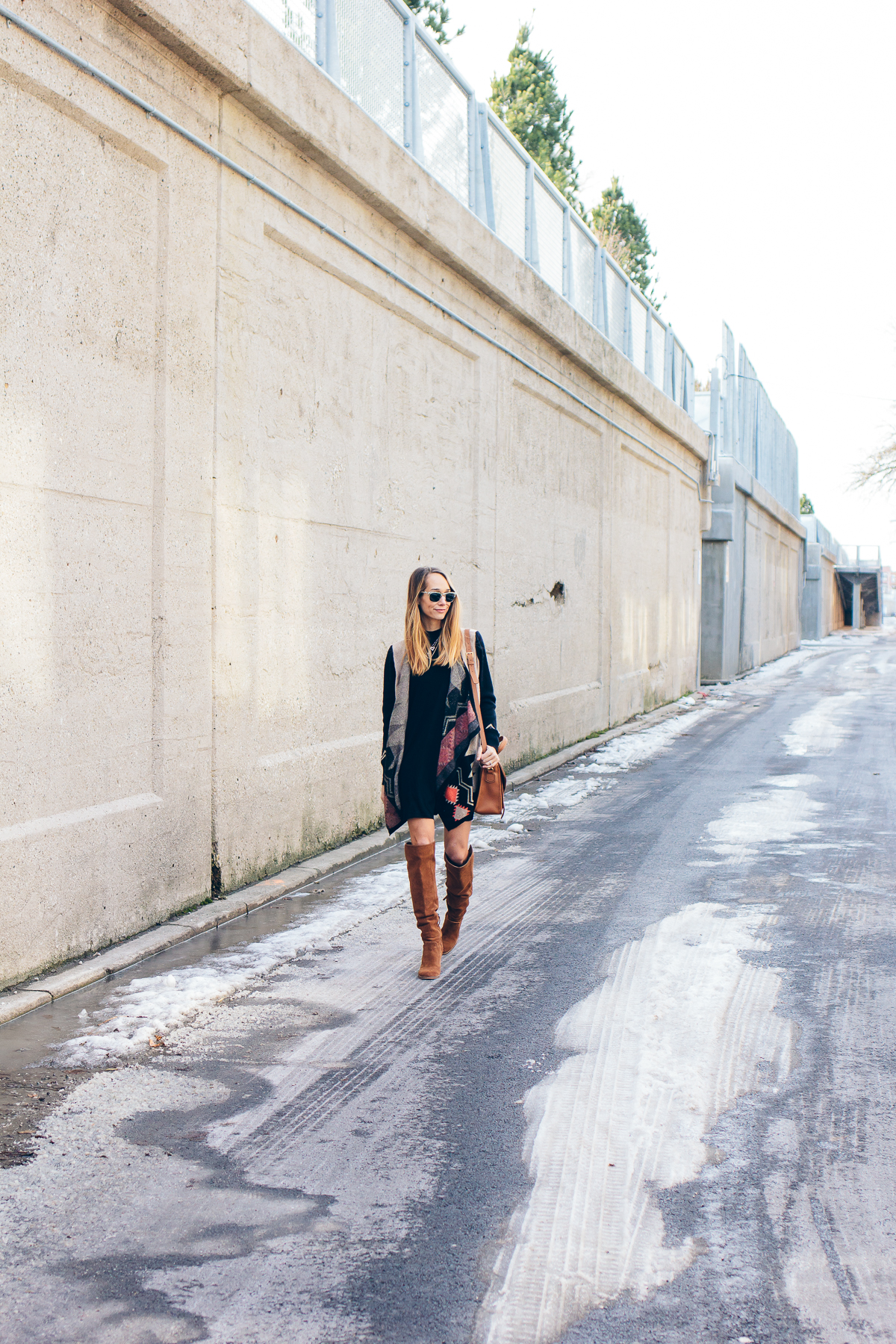 casual black dress, aztec cardigan, over the knee boots — via @TheFoxandShe