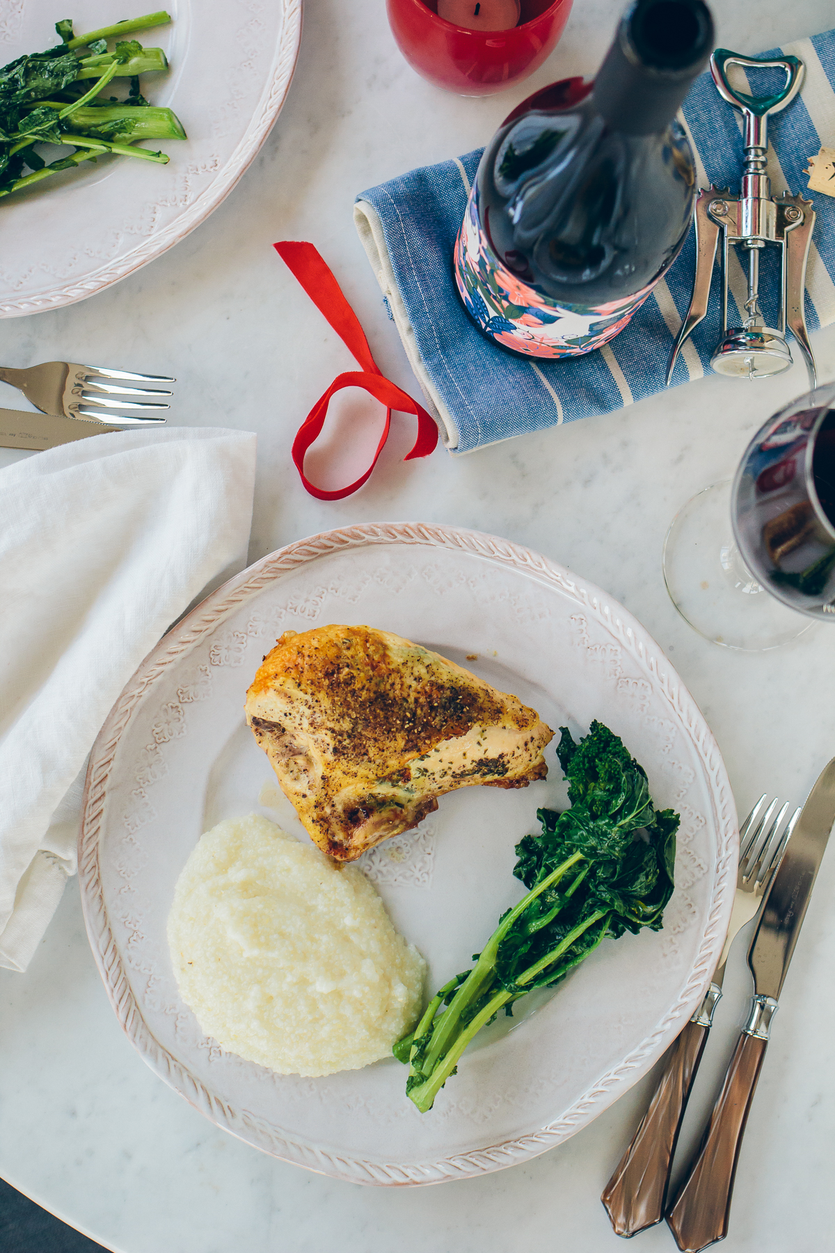 roasted chicken, parmesan grits, broccoli rabe, simple date night dinner — via @TheFoxandShe
