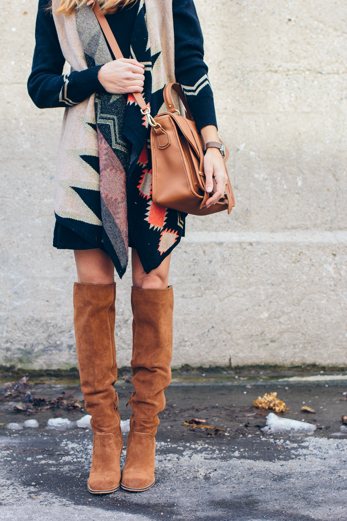 casual black dress, aztec cardigan, over the knee boots — via @TheFoxandShe