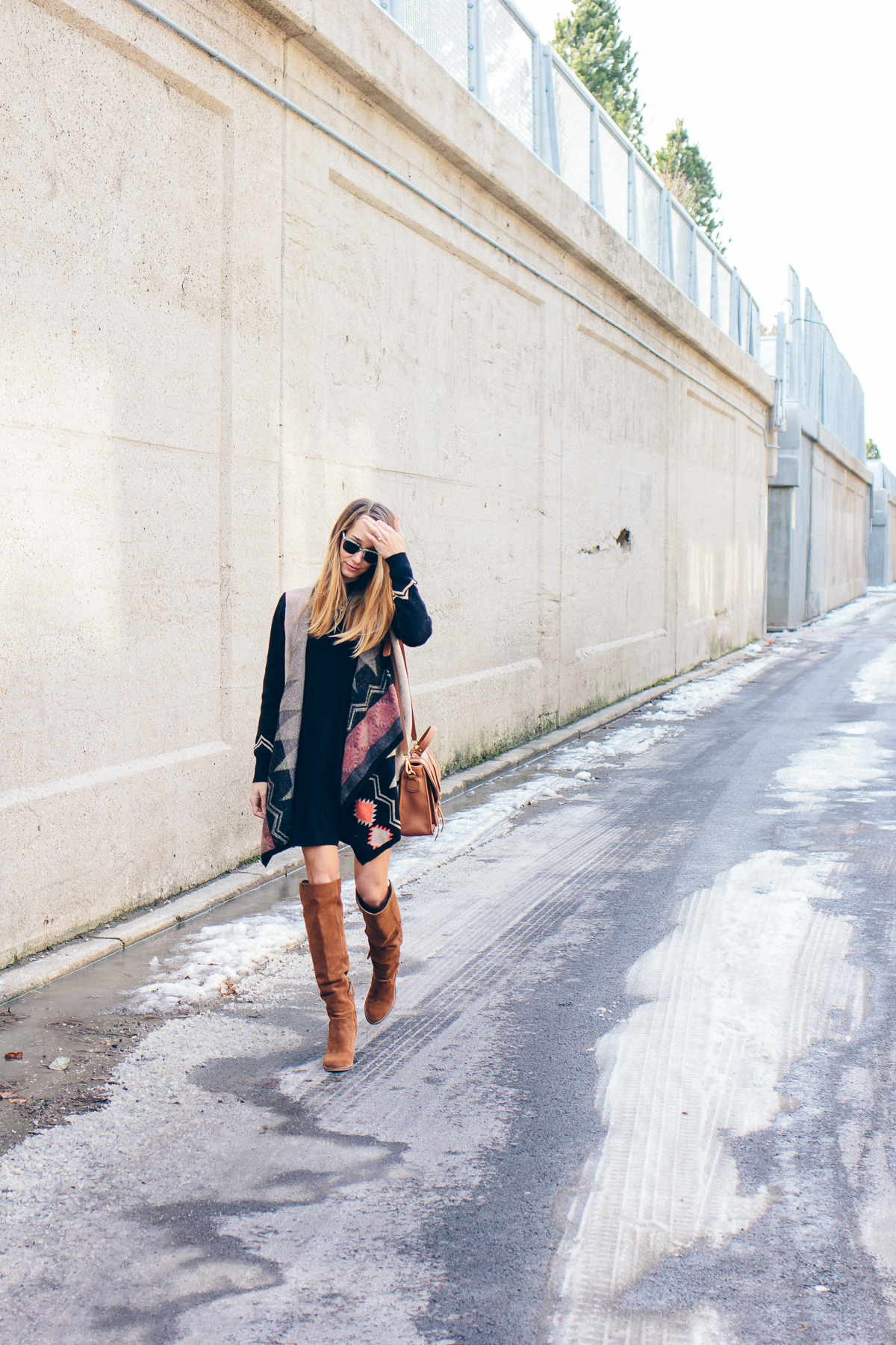 casual black dress, aztec cardigan, over the knee boots — via @TheFoxandShe