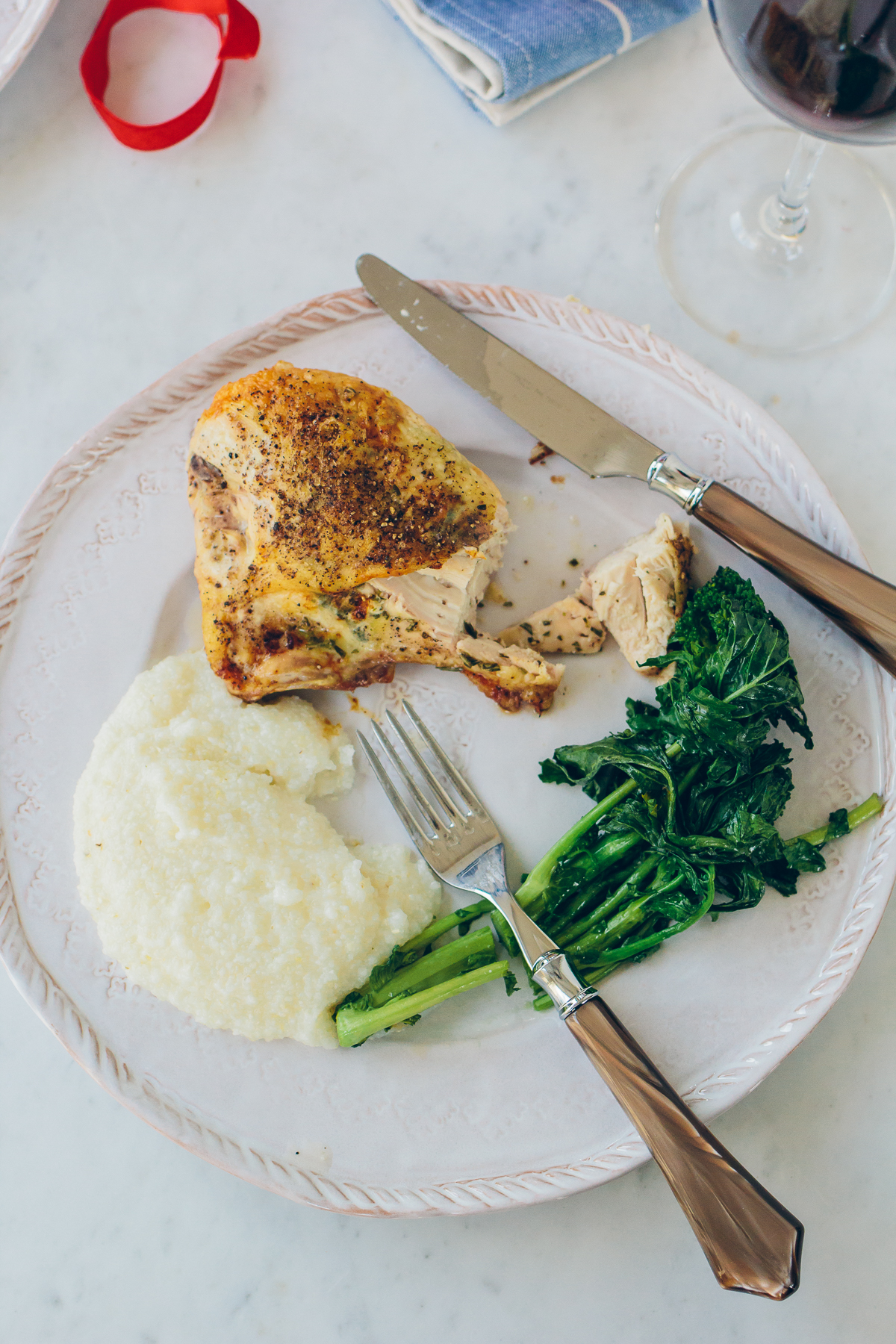roasted chicken, parmesan grits, broccoli rabe, simple date night dinner — via @TheFoxandShe