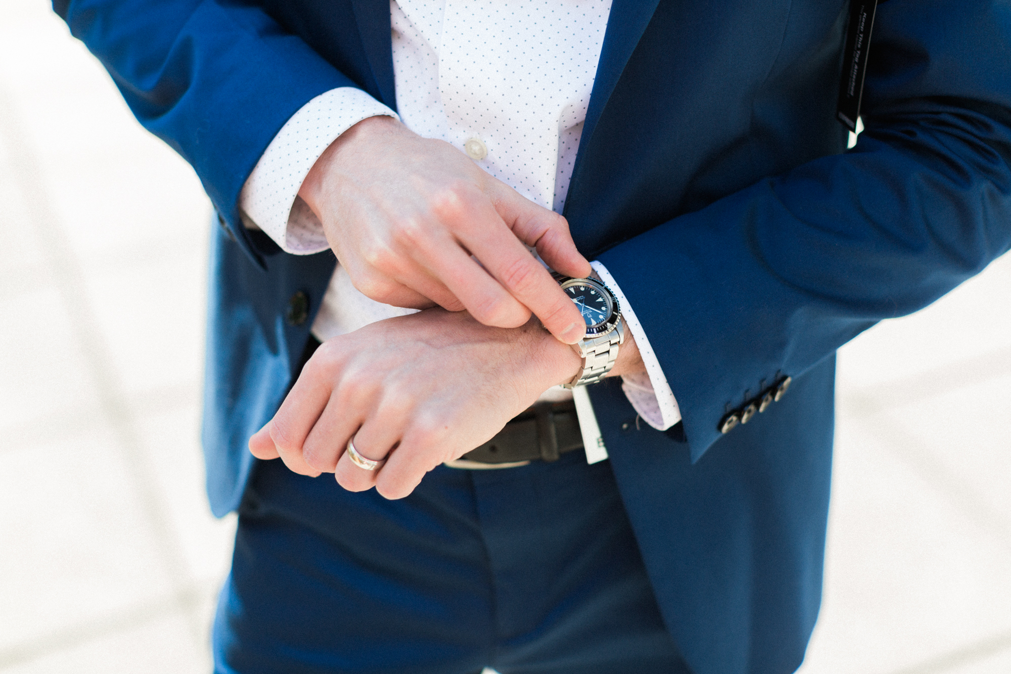 blue suit and vintage watch