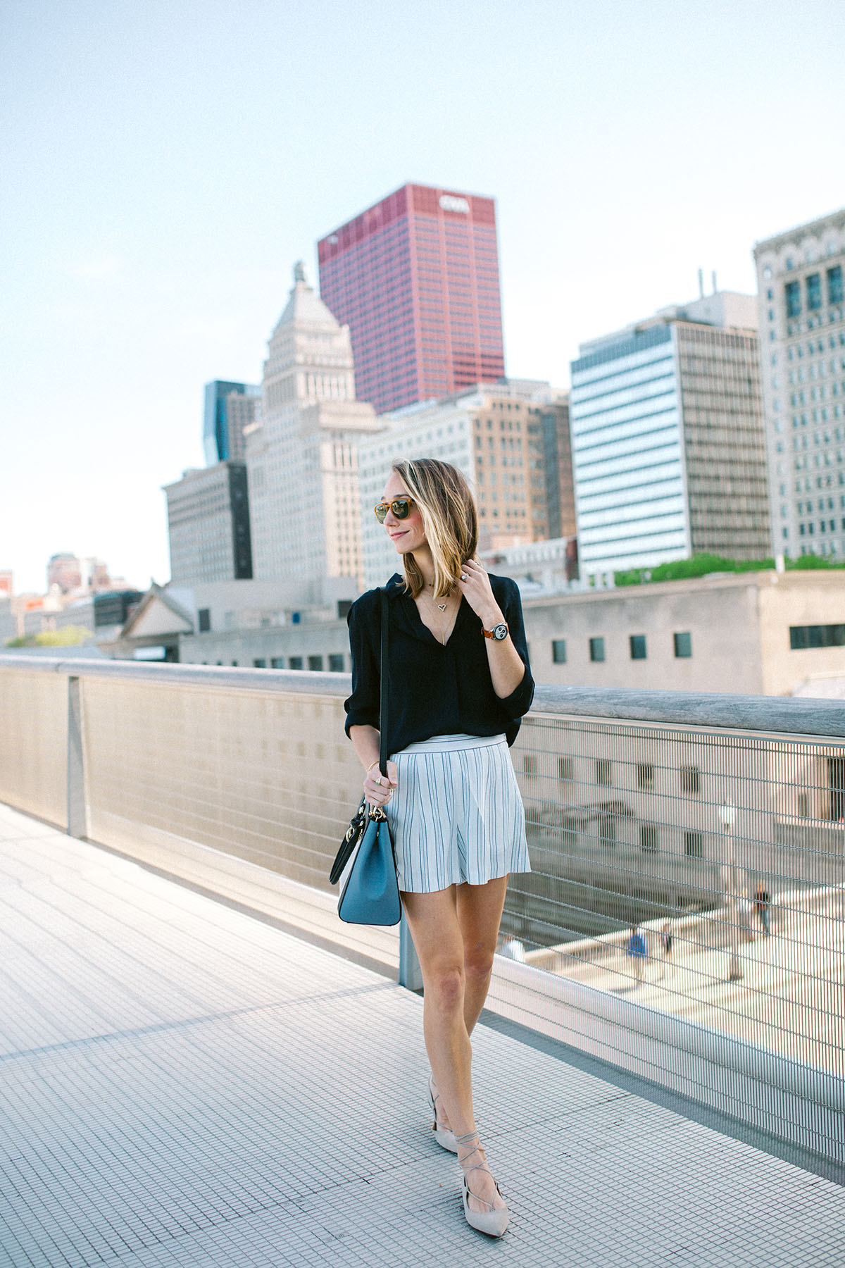 striped shorts and silk blouse