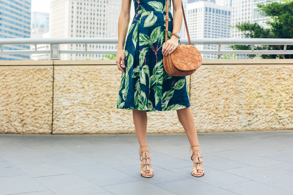 woven saddle bag, palm print dress