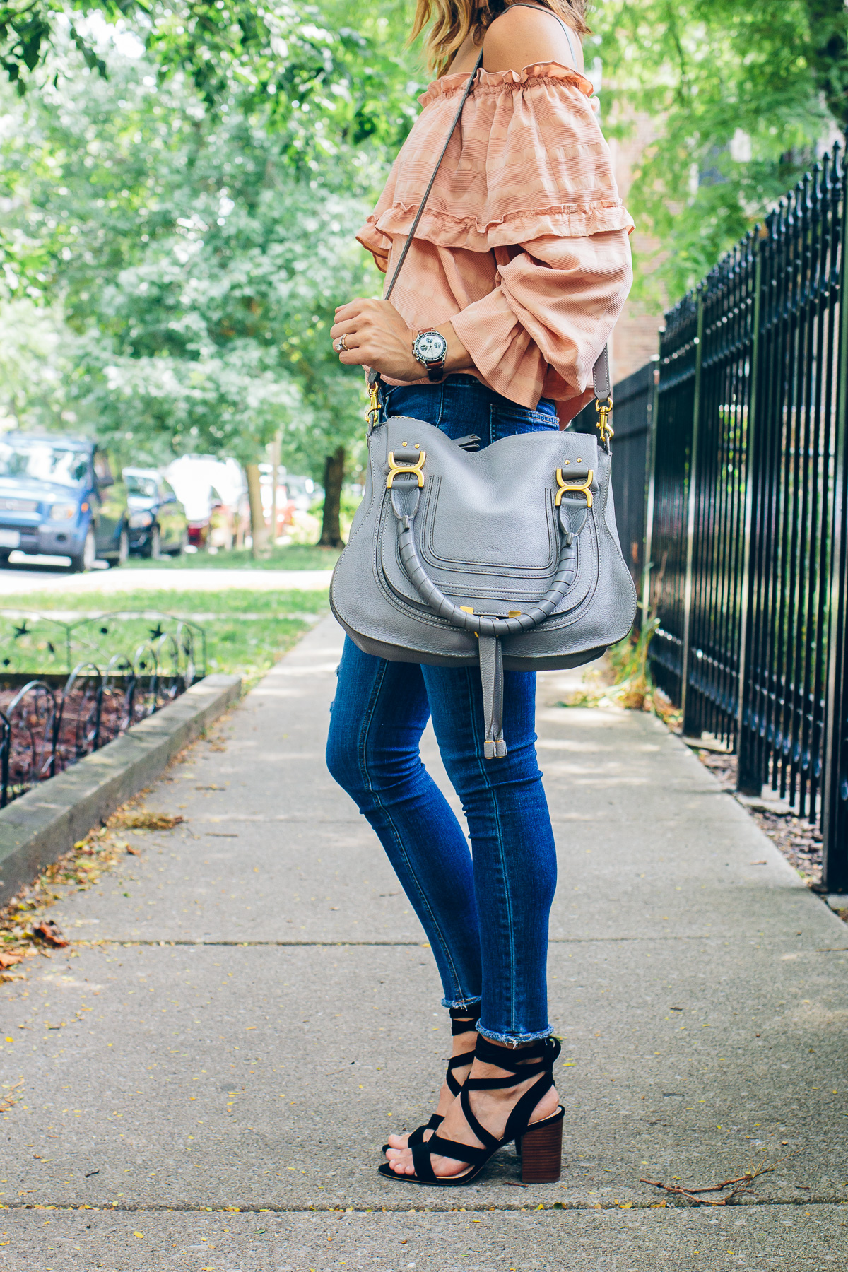 peachy top and jeans