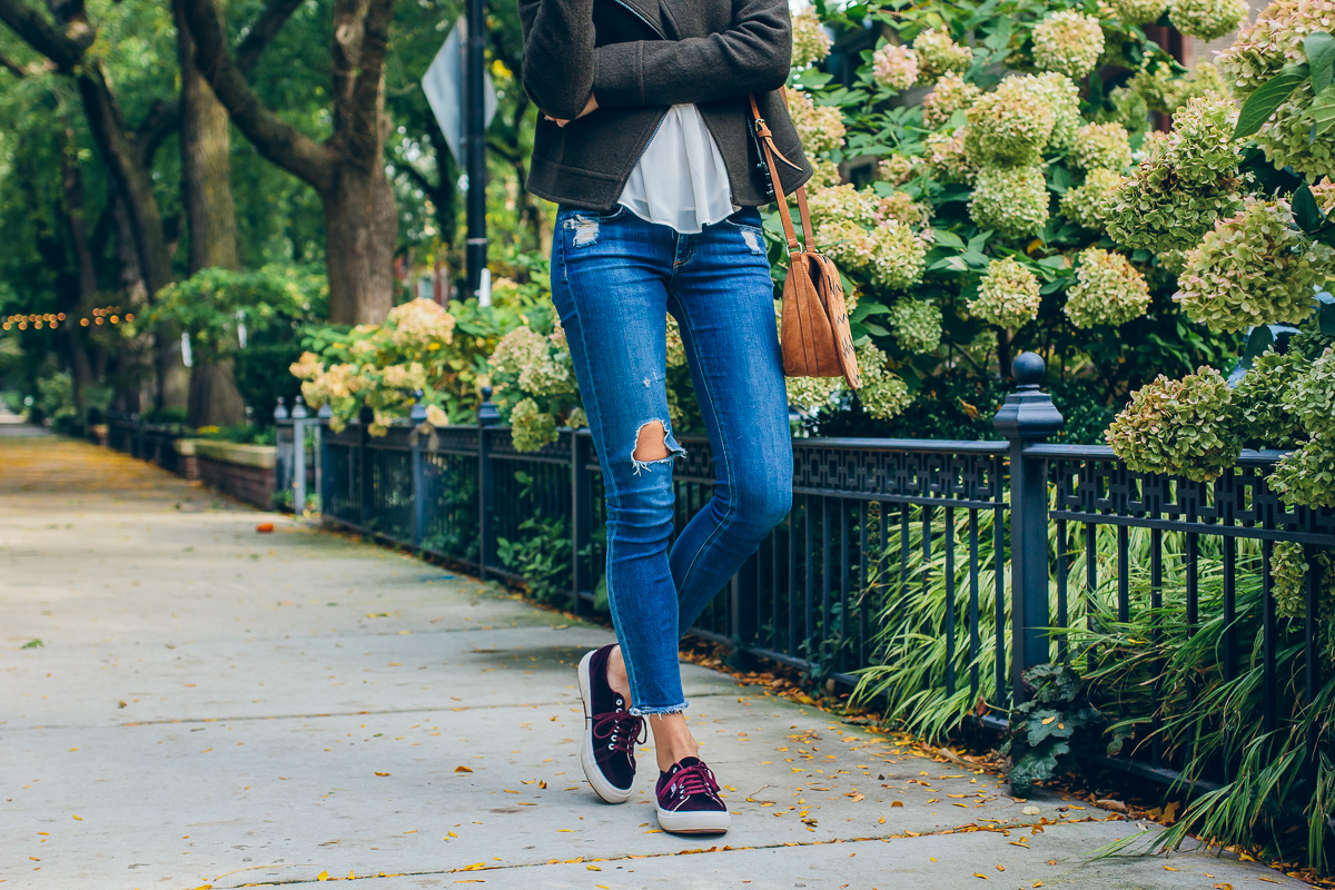 ripped jeans and sneakers