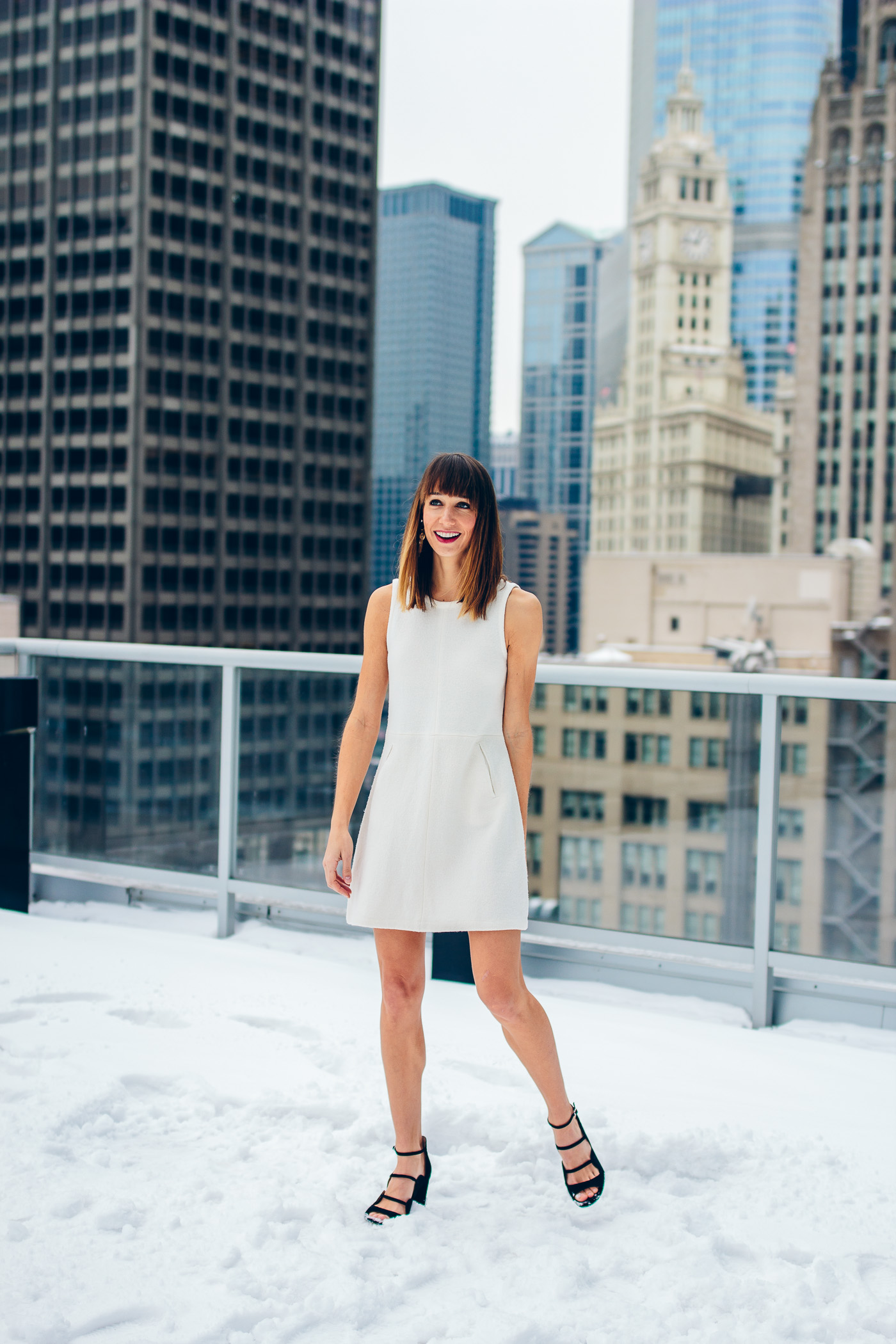 Chicago fashion blogger Blair Staky wearing a winter white dress