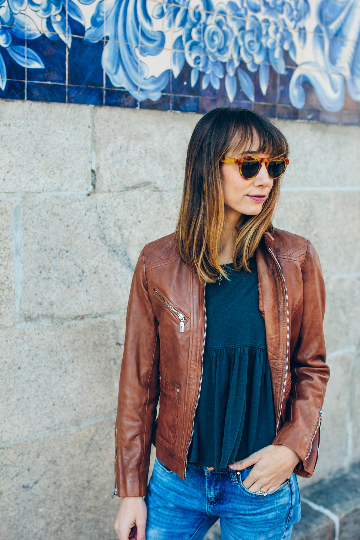 leather jacket and peplum top