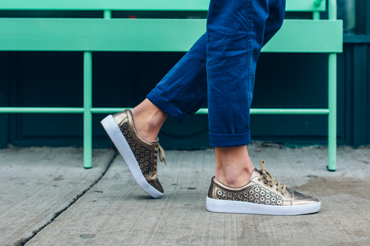 @anthropologie gold perforated sneakers