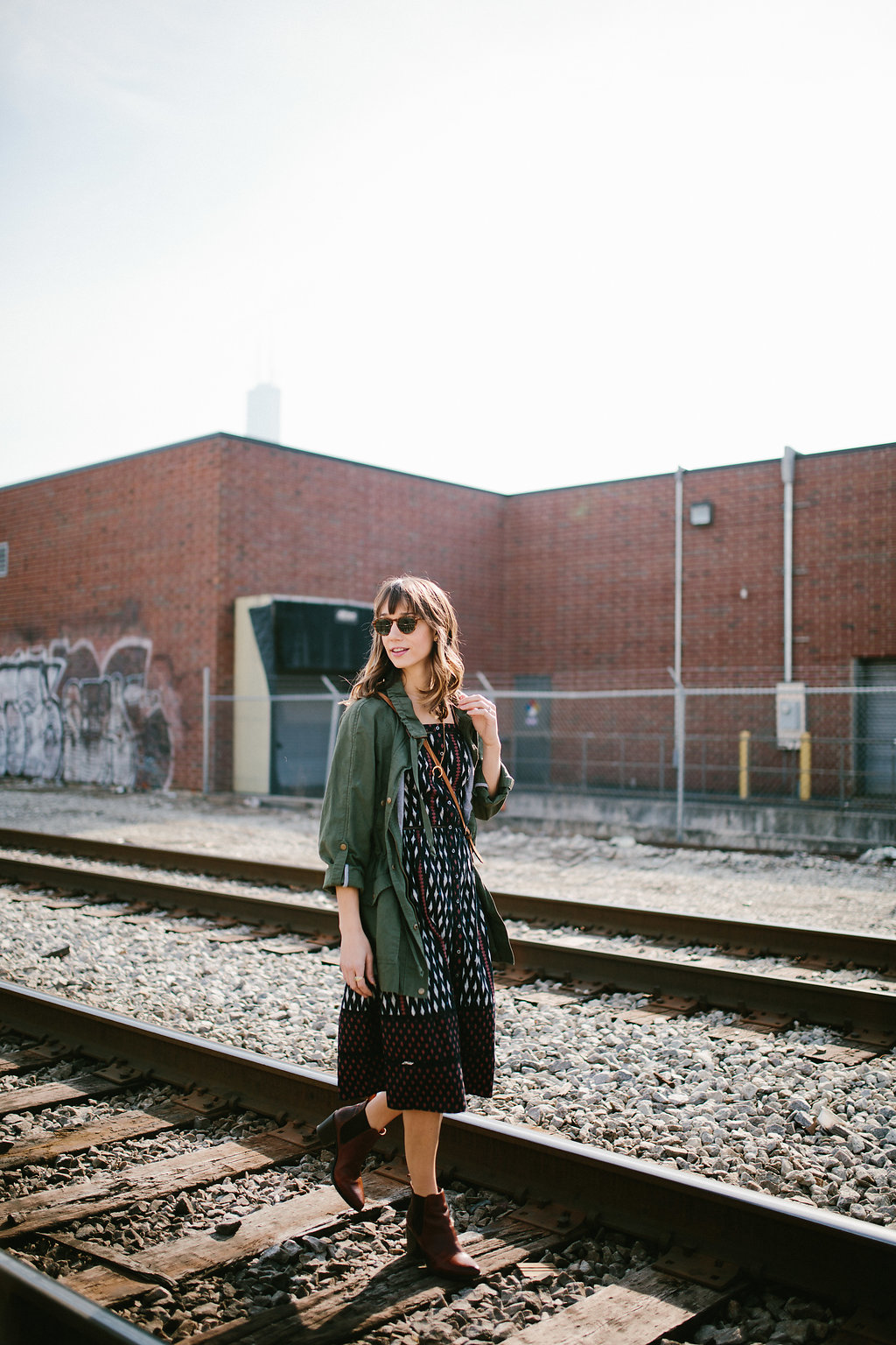 dress and military jacket