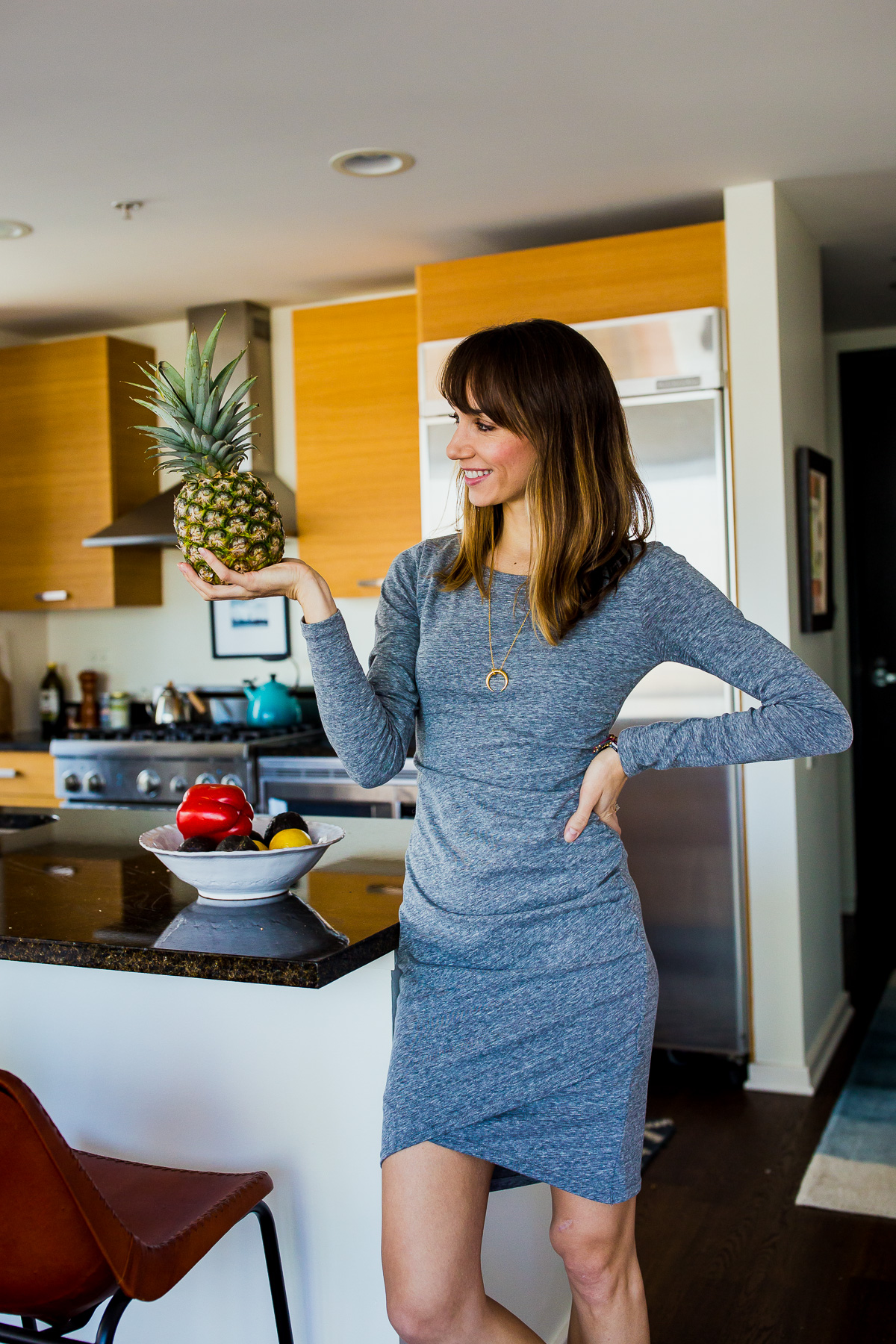 pineapples and a grey dress