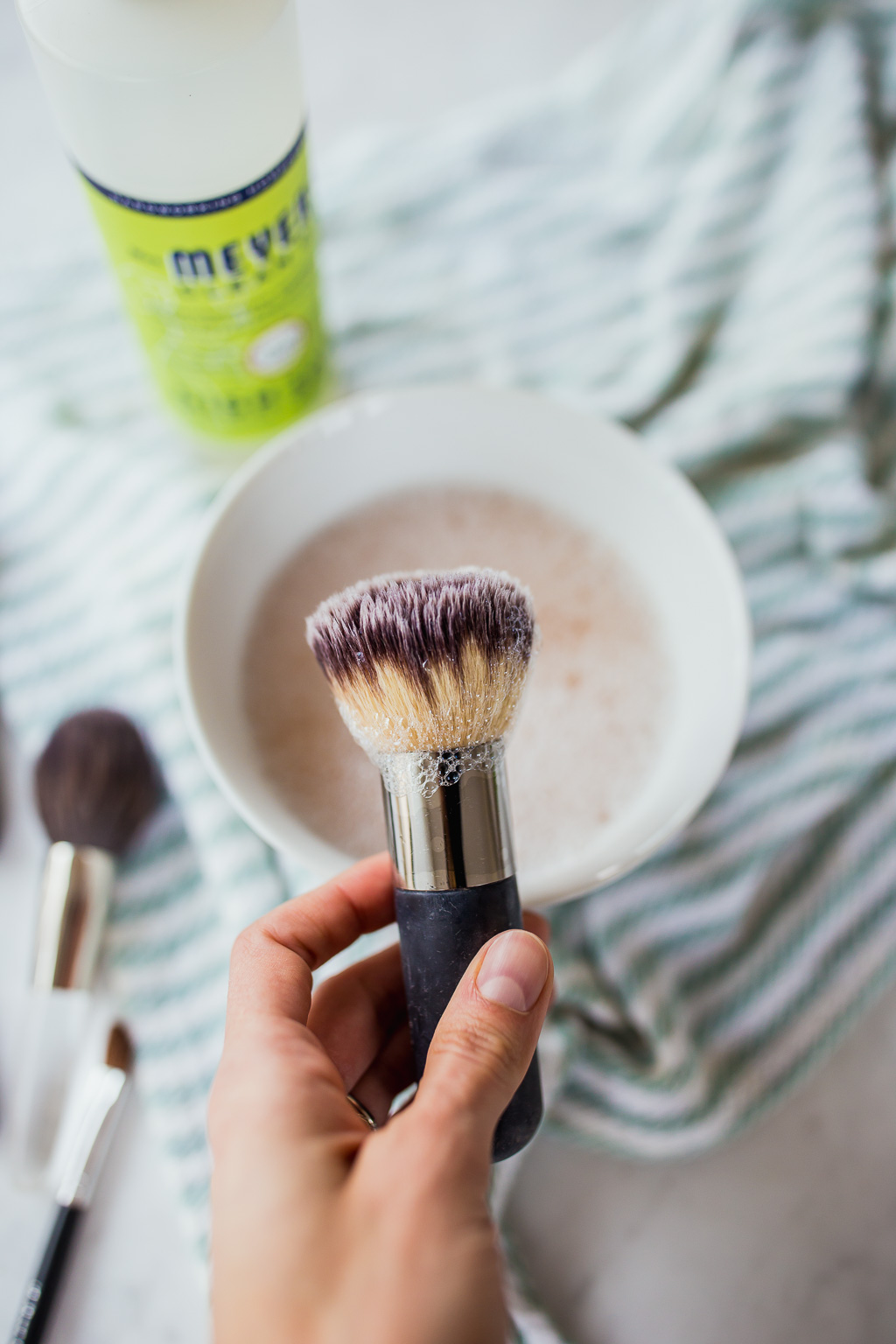 makeup brush after dipping in a cleaner 