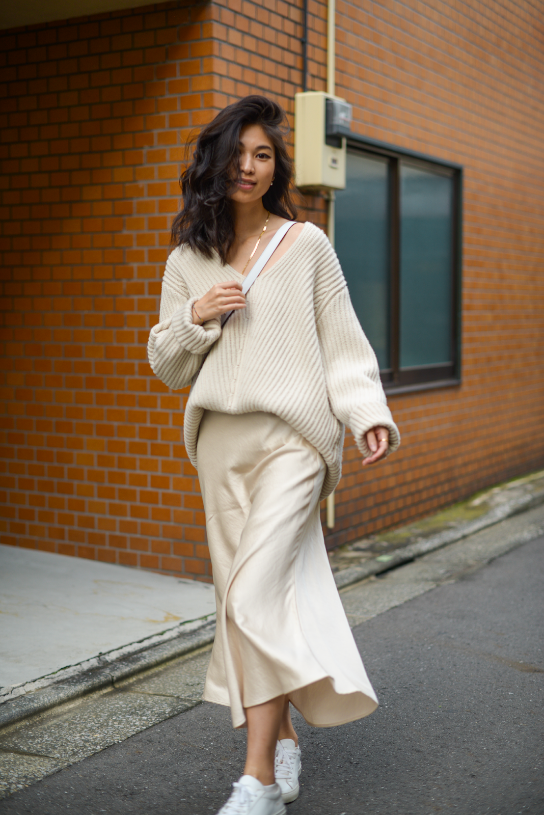 cream monochromatic outfit with oversized sweater