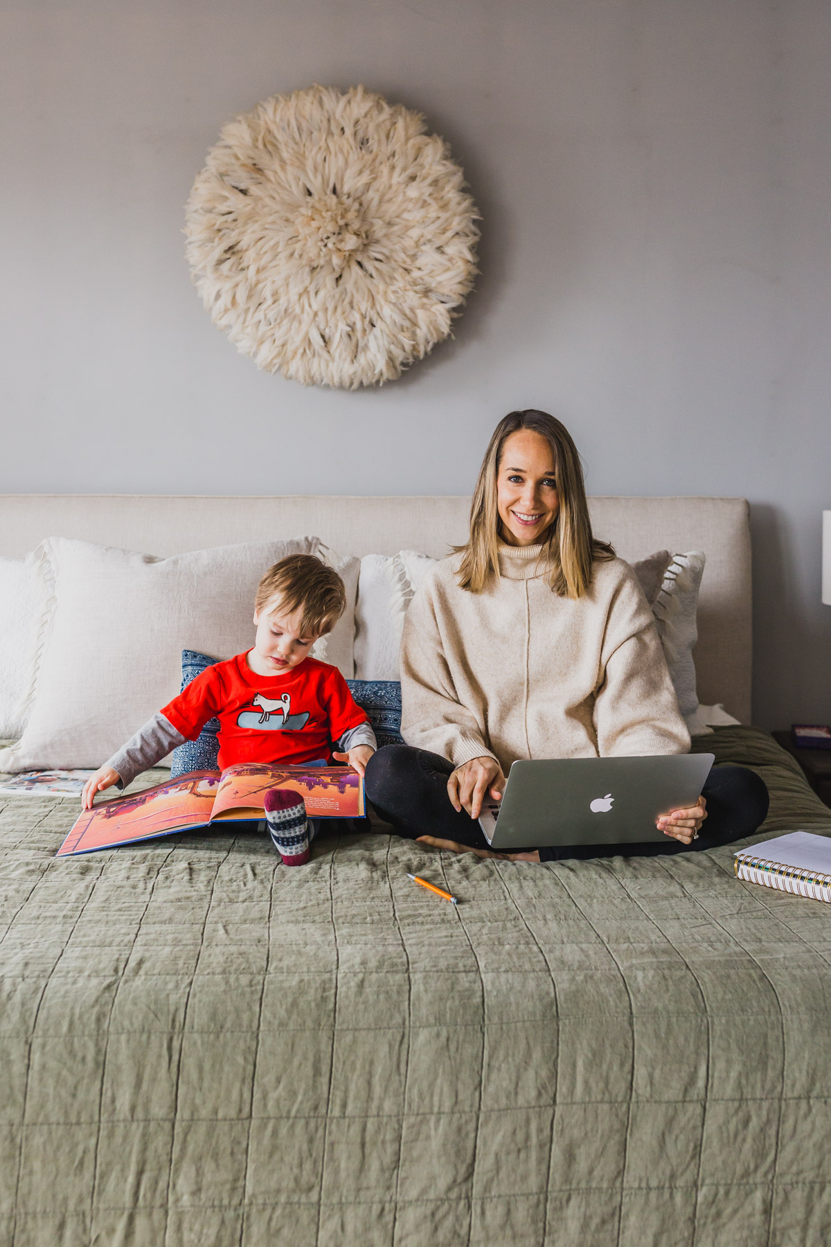 I'm sharing my productive day routine and work from home tips for moms with toddlers. This work at home toddler mom schedule highlights how to block schedule time, easy indoor toddler activities to burn energy, our screen times rules and how to have a productive nap times. Balancing mom life with a job at home is tough, but not impossible, click through for parenting hacks and my work from home schedule. #workfromhomemom #toddleractivities