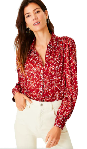 woman wearing floral blouse and jeans