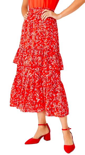 woman wearing transitional pieces floral skirt