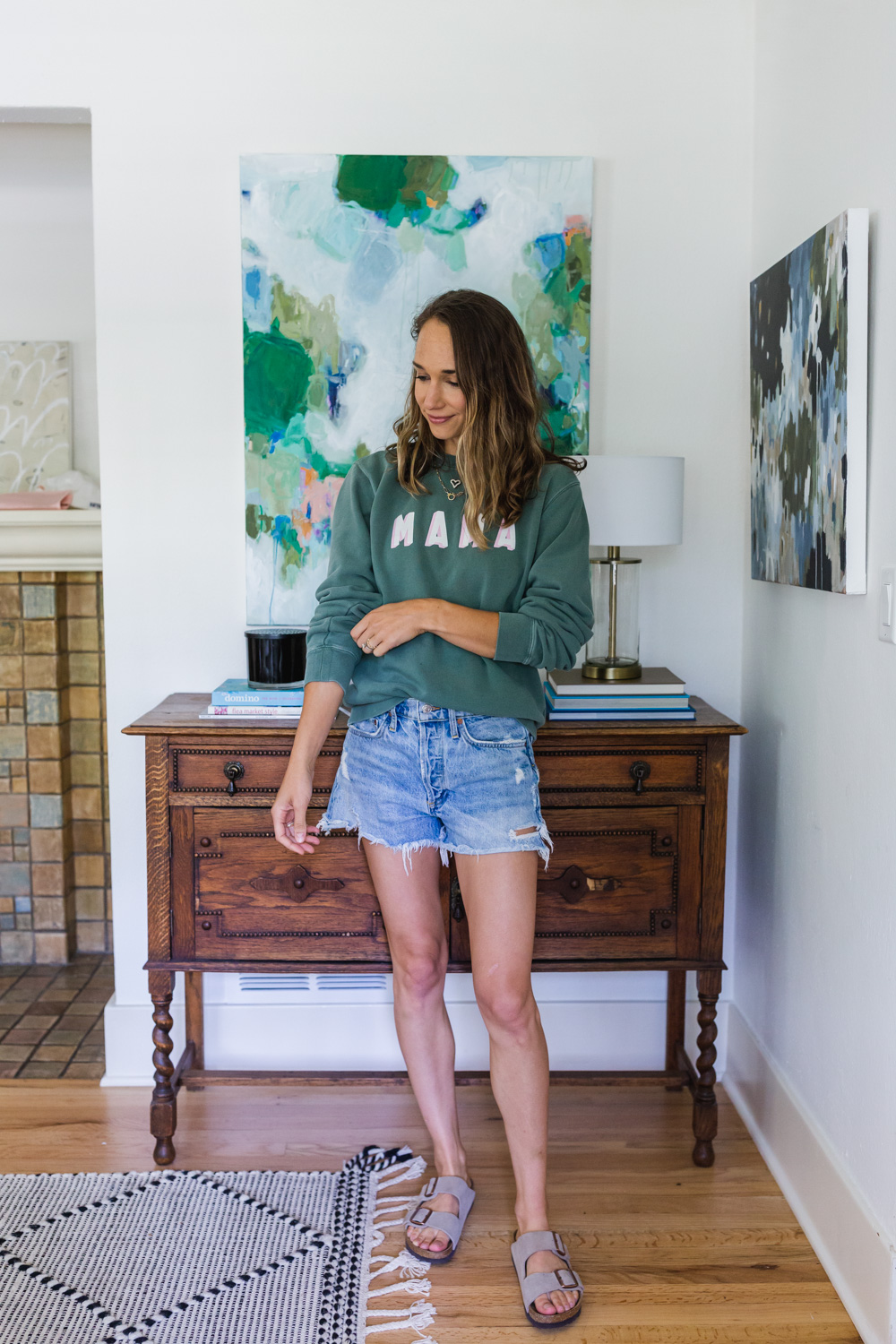 woman wearing shorts and sweater