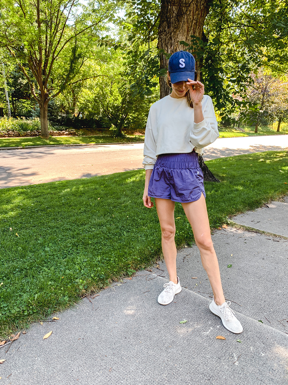 woman walking with her allbirds runners