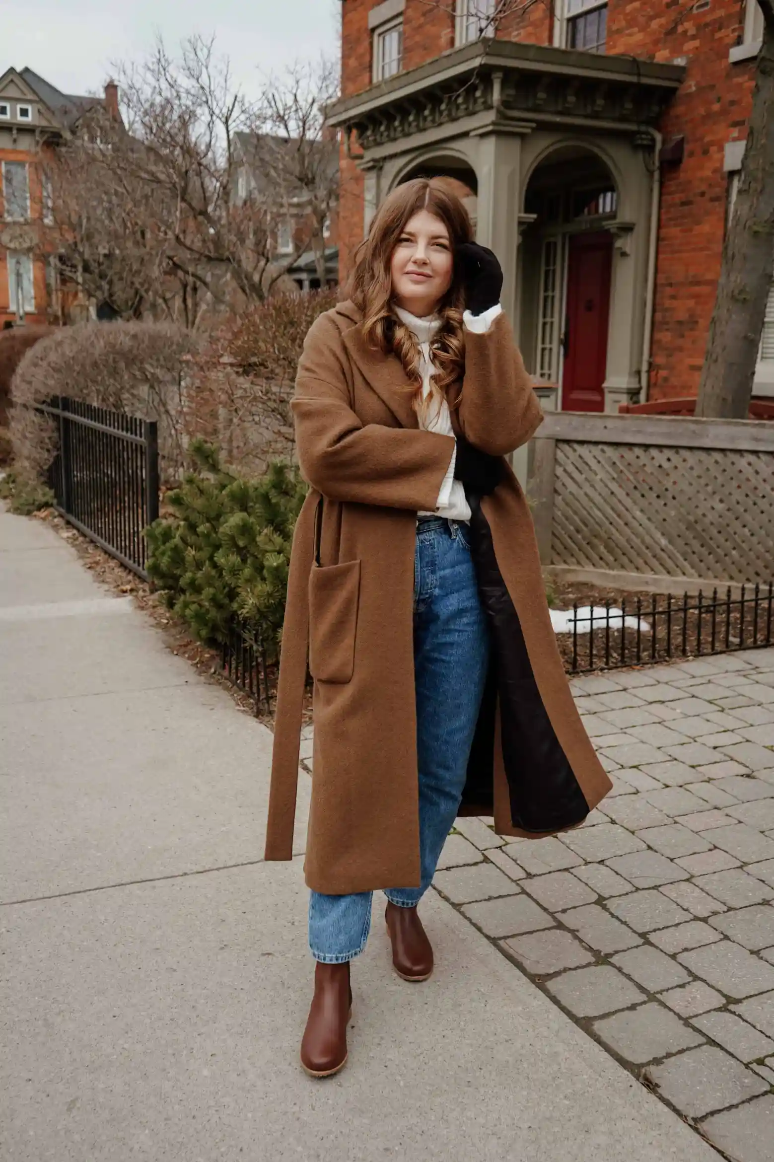 fall outfit with oversized coat and flat ankle boots