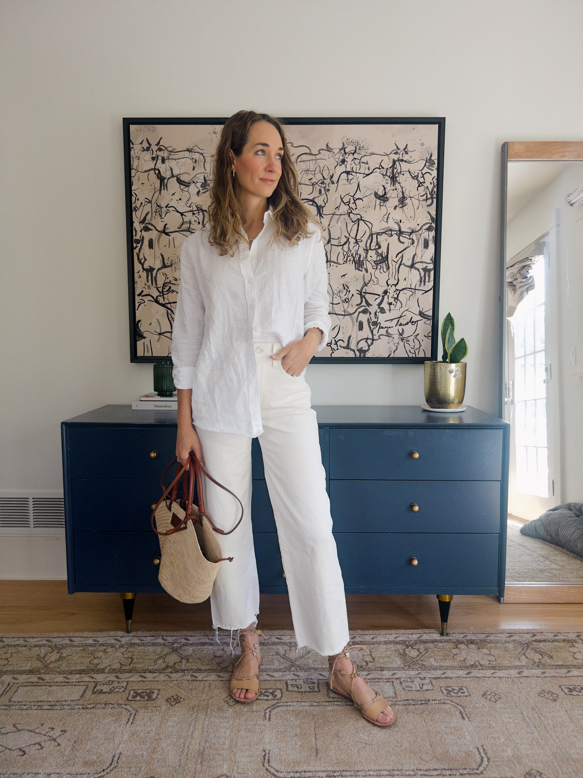 white pants outfit with white button-down shirt