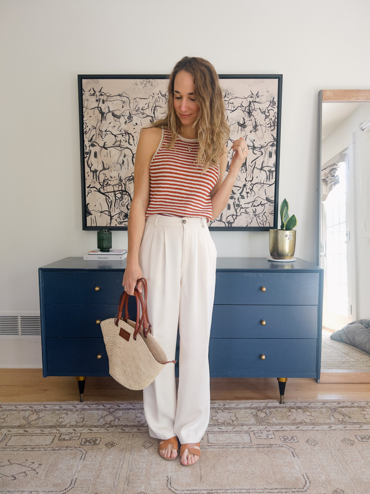 white trousers outfit with striped knit tank