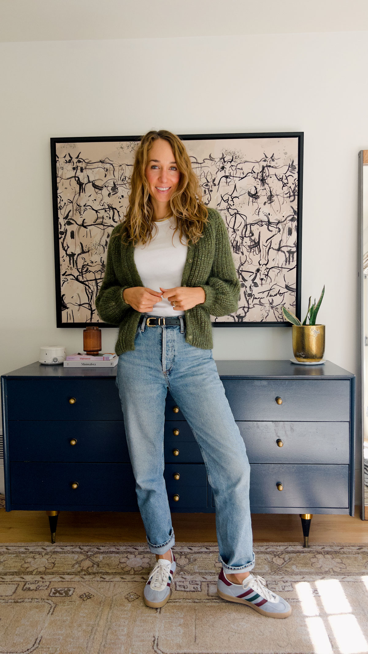 knit cardigan and jeans and sneakers outfit